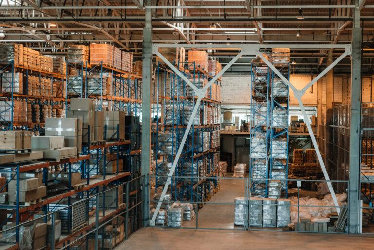 modern warehouse interior with boxes and containers on shelves